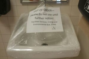 Out of Order sign on sink